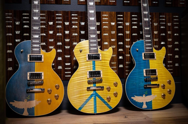 Gibson Guitar Manufacturer to Auction off Four Blue-and-Yellow Guitars to Help Ukraine